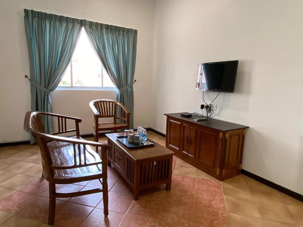 Delima Hotel & Homestay Порт-Диксон Экстерьер фото