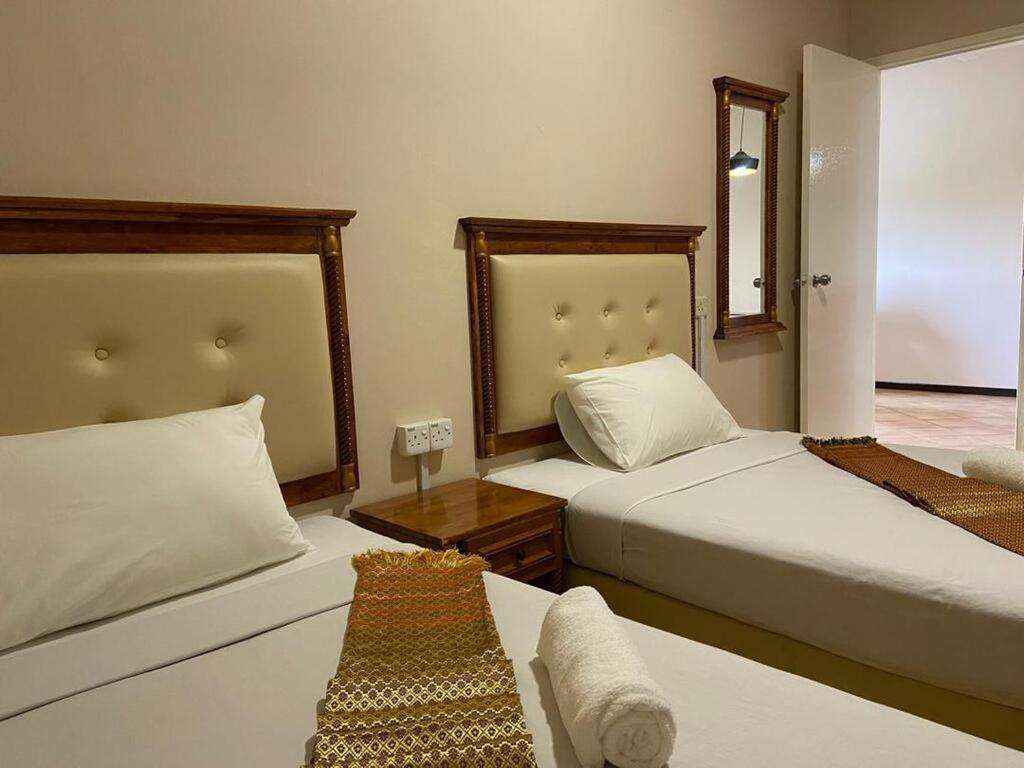 Delima Hotel & Homestay Порт-Диксон Экстерьер фото